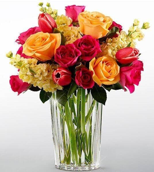 Beauty and Grace™ Bouquet by Vera Wang - fuchsia tulips , yellow stock , peach roses , hot pink spray roses , vase arrangement
