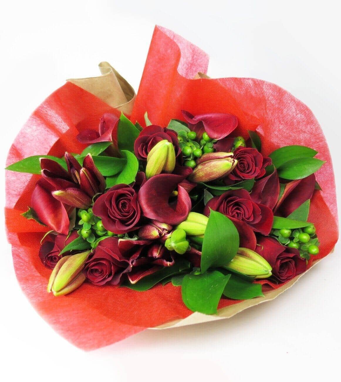 Deep Riches Bouquet™ - bouquet withRed roses, burgundy Mini Calla and Asiatic Lilies are arranged with Green Hypericum and Ruscus