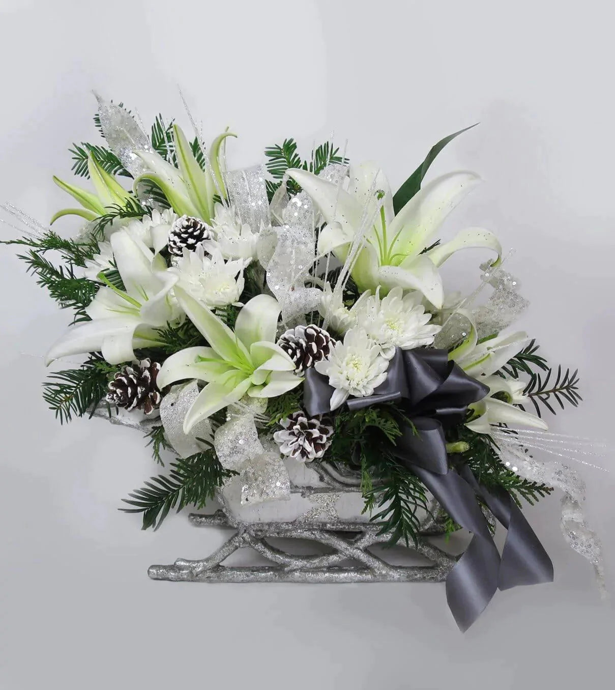 Sleigh Ride Arrangement - sleights , Christmas arrangement , Sleigh Ride Arrangement , asiatic lilies , pine cones , xmas twigs , twigs