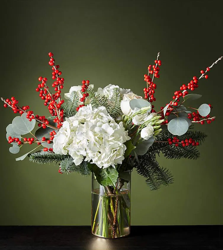 Share My World Bouquet Standard - peach roses , yellow tulips , black callas , peach ranunculus , pink ranunculus, black scabiosa , heather , white snapdragons , white Ornithogalum , vase arrangement