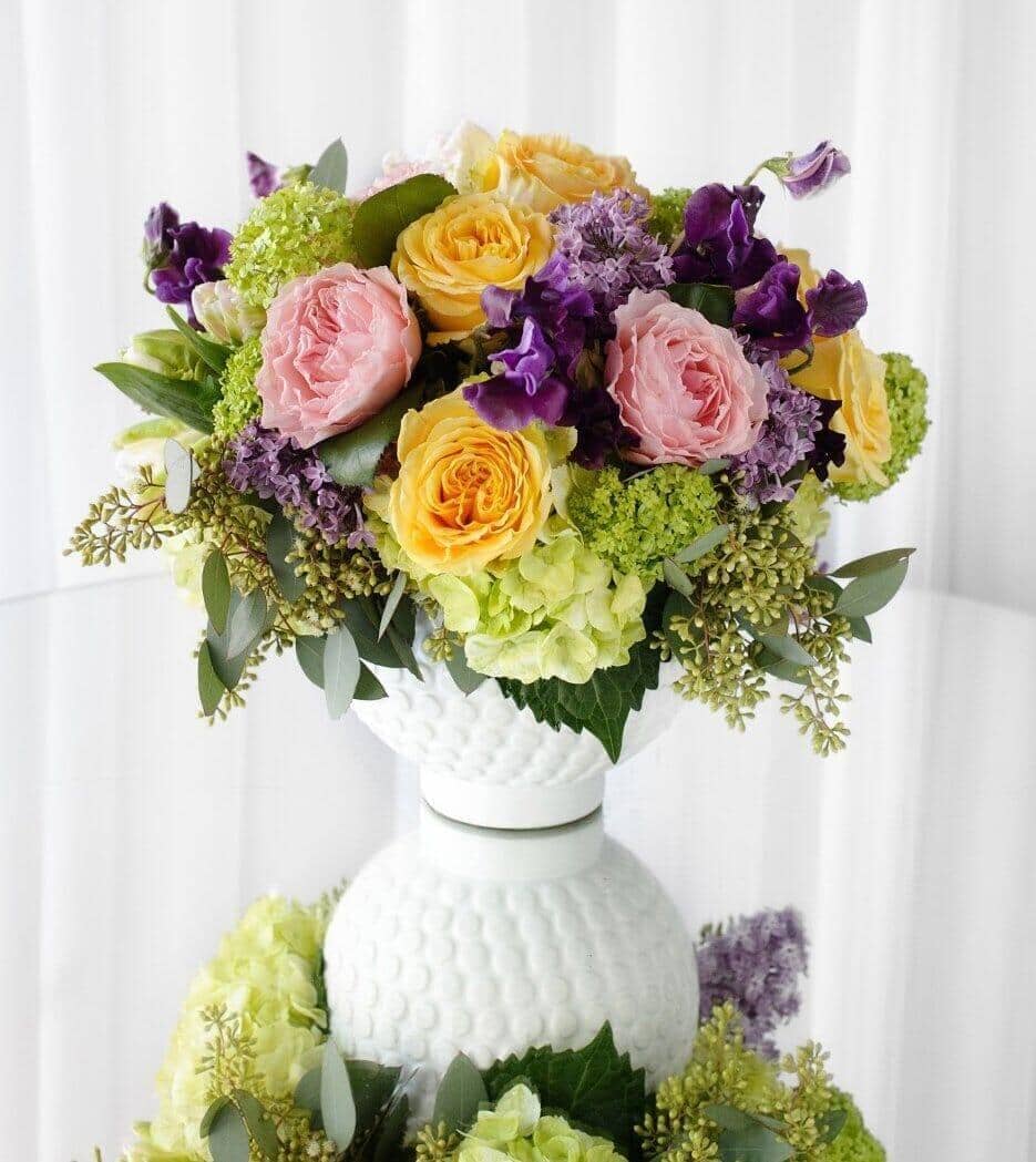 Precious Gift Bouquet - vase with pink and yellow garden roses, green hydraneas, viburnum snowballs, purple sweet peas, parrot tulips, lilac and seeded eacaliptus