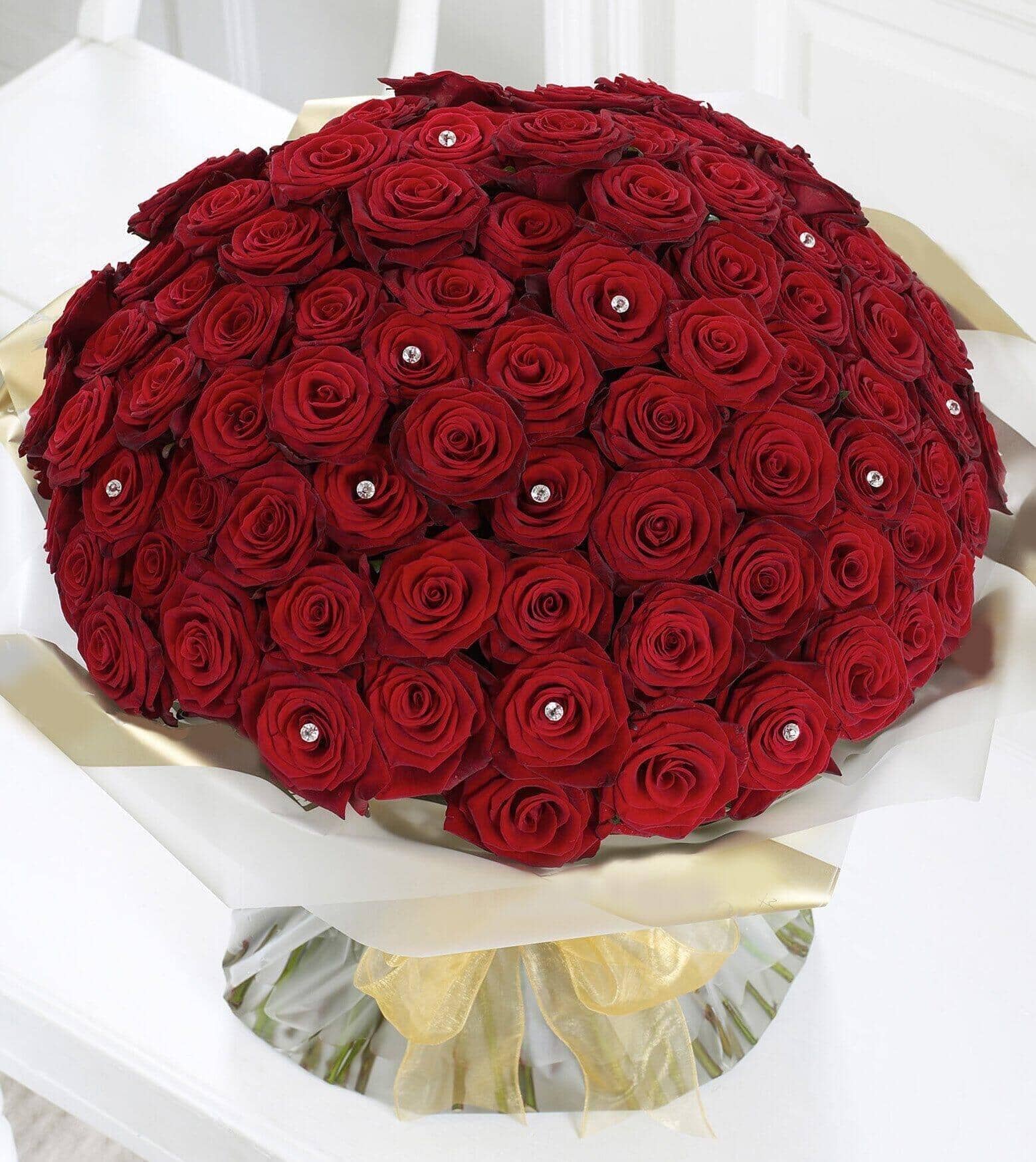 Ultimate 100 Rose Hand-tied - red roses , diamanté pins , ribbon , bouquet